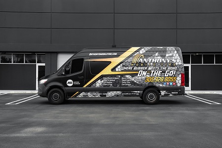 mobile service truck with Anthonys Mobile Tire logo in white and gold letters